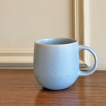 stoneware mug morning coffee ritual rounded belly handle