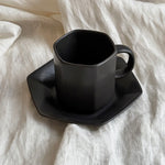 matte black ceramic tea cup saucer velvet glaze detail
