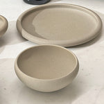 Large and small drum-edge plates together