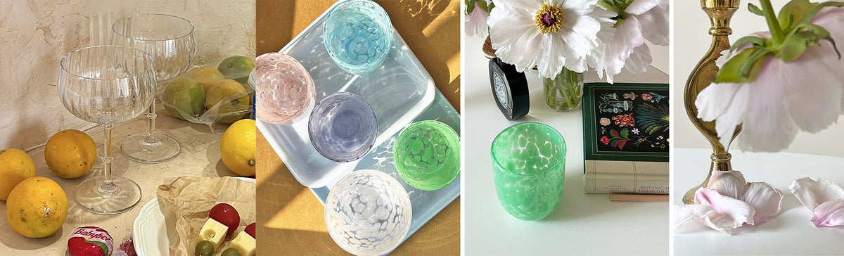 Hand-blown glasses with citrus, colorful tumblers and flowers
