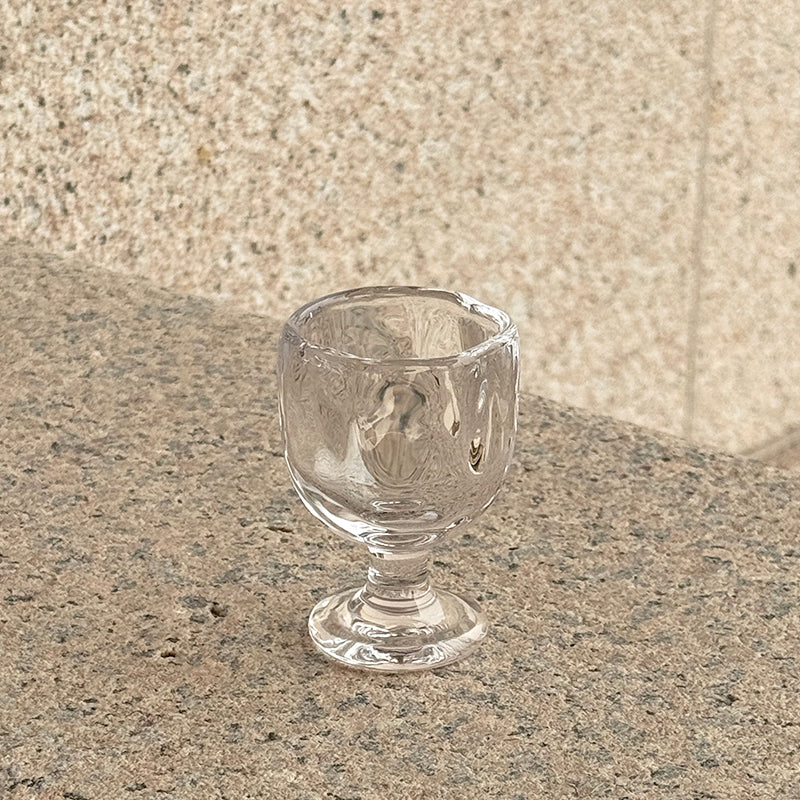 hand-textured shot glass natural light play artisan
