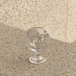 hand-textured shot glass natural light play artisan
