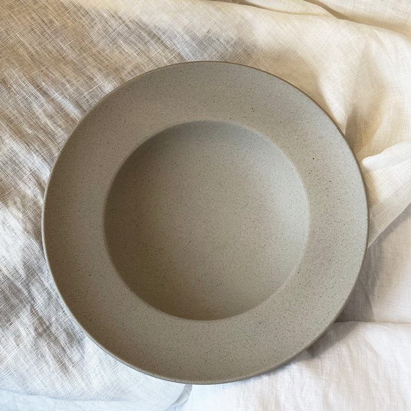 primitive stoneware soup bowl sand-blasted matte texture top view