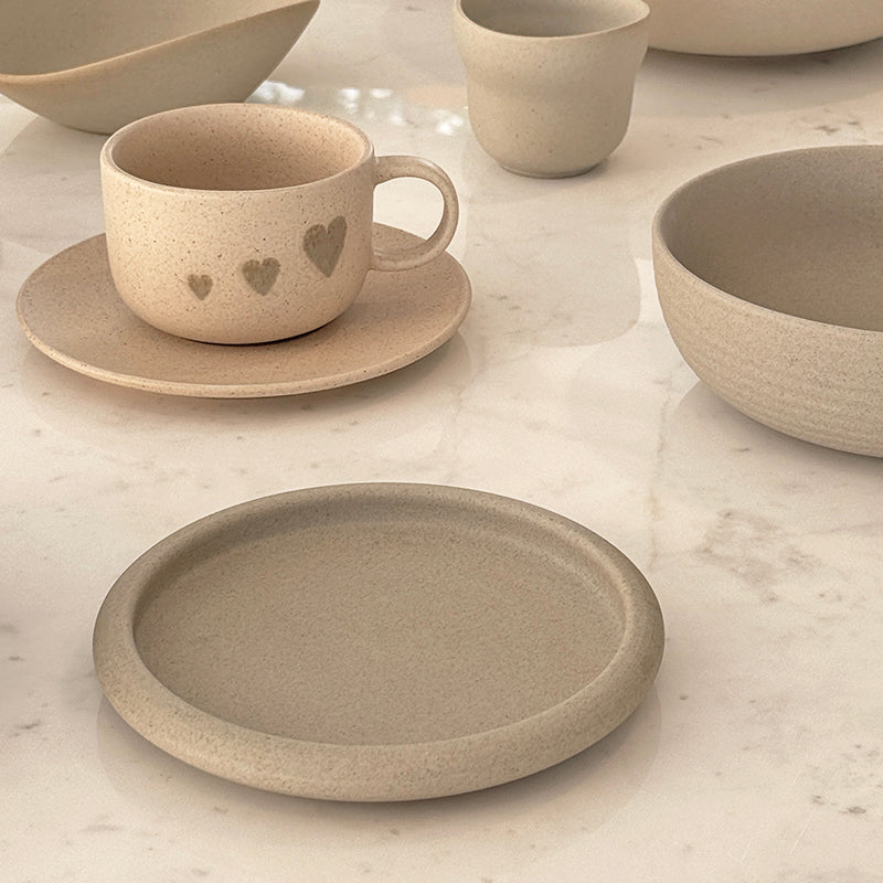 Drum-edge plate with cup and bowl collection