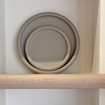 Stoneware drum-edge plates from above