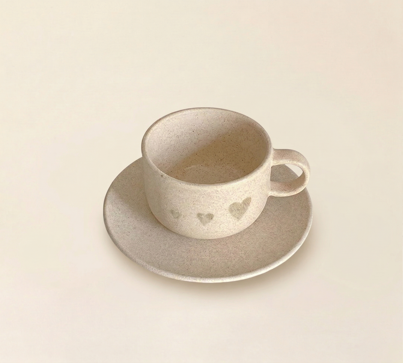ceramic cup and saucer set heart print speckled matte glaze SundayWare