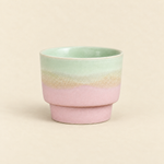 Pink 170 ml handleless ceramic coffee cup with cream and pale celadon gradient glaze