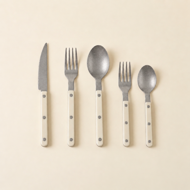 Matte antique-finish riveted 5-piece flatware set in creamy white, without chopsticks